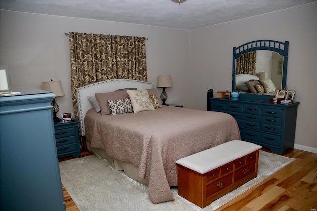 bedroom featuring light hardwood / wood-style floors