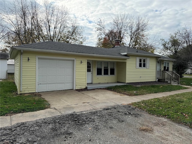 single story home featuring a garage