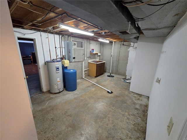 unfinished basement featuring water heater