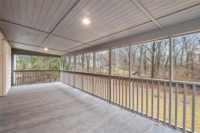 unfurnished sunroom with a wealth of natural light