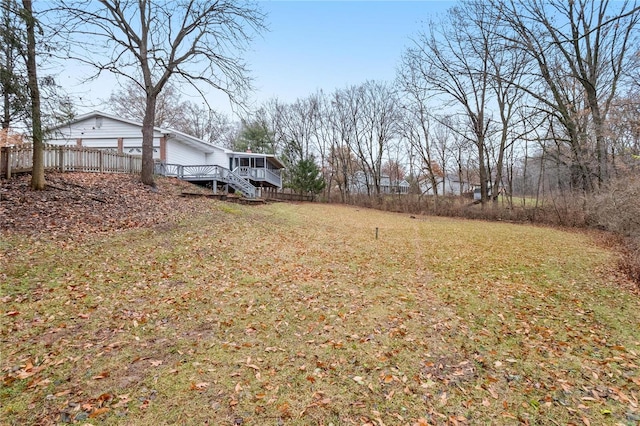 view of yard featuring a wooden deck