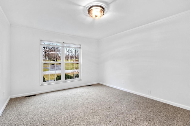 empty room featuring carpet flooring