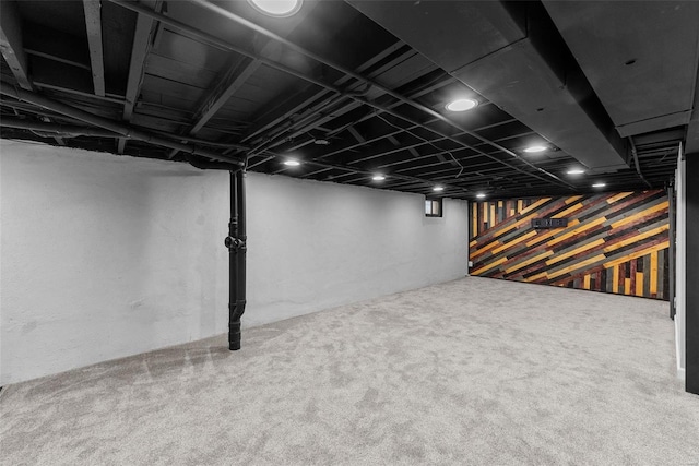 basement featuring carpet flooring