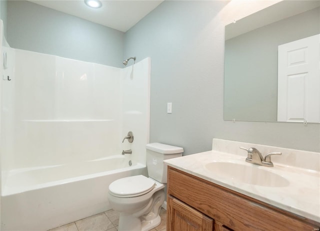 full bathroom featuring tile patterned flooring, vanity, toilet, and shower / washtub combination