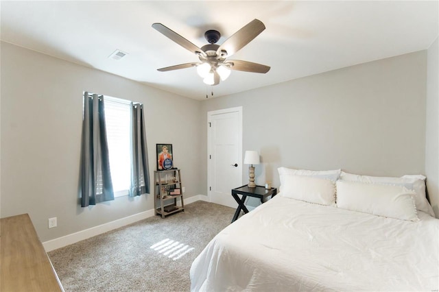 carpeted bedroom featuring ceiling fan