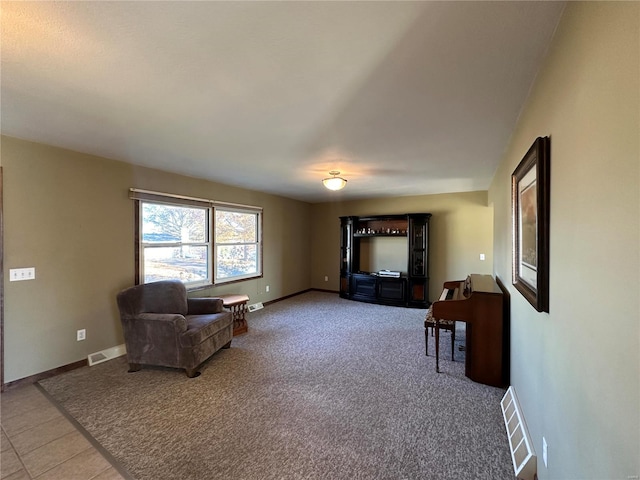 living area featuring carpet floors