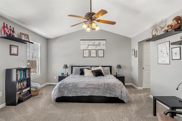 bedroom featuring ceiling fan, vaulted ceiling, and carpet