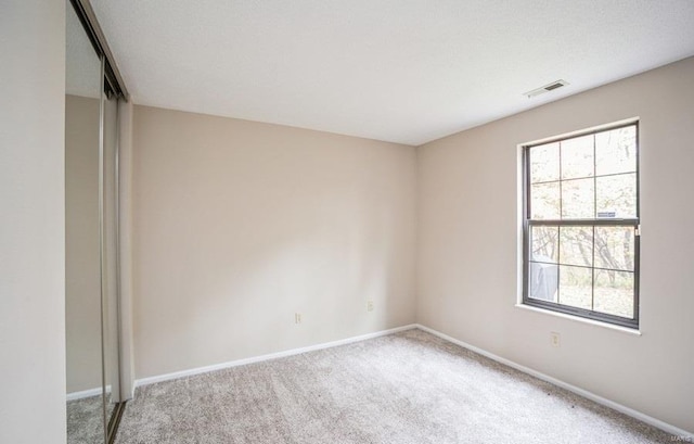 empty room with light carpet