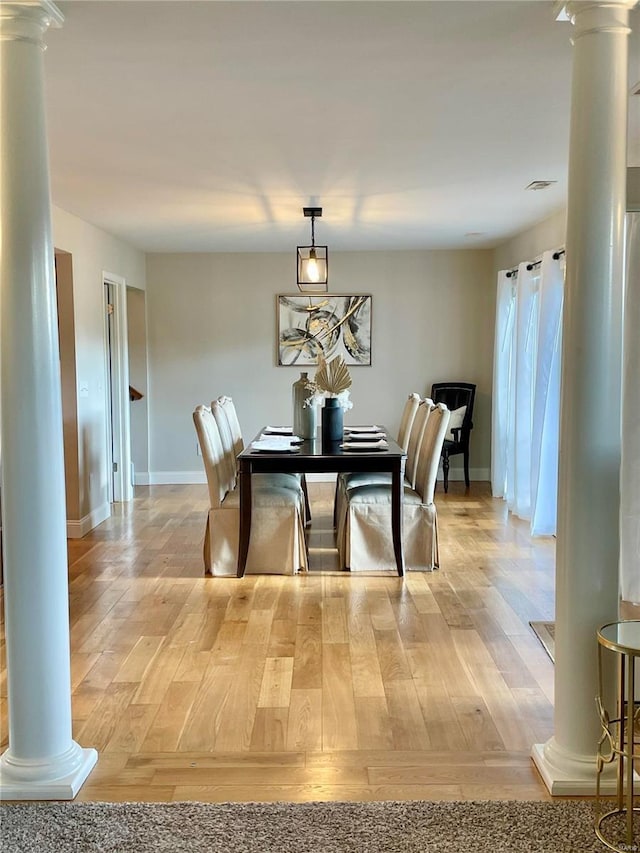 dining room featuring light wood-type flooring