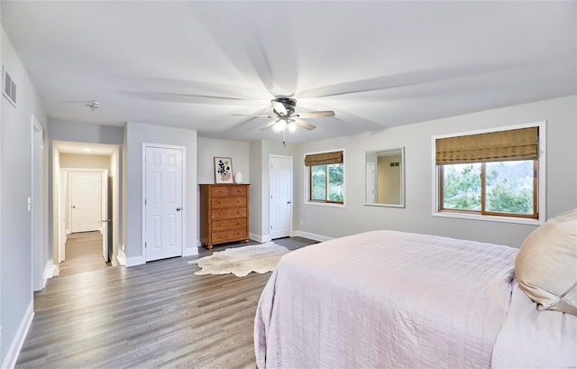 bedroom featuring ceiling fan and wood-type flooring