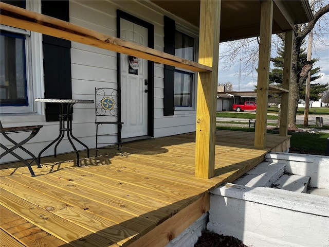 wooden deck featuring a porch