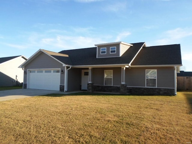 view of front of house featuring a garage and a front lawn