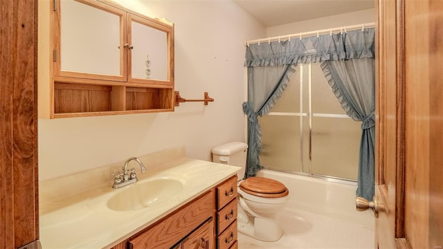 full bathroom featuring vanity, toilet, and shower / bath combo with shower curtain