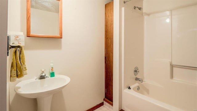 bathroom featuring sink and shower / bathtub combination