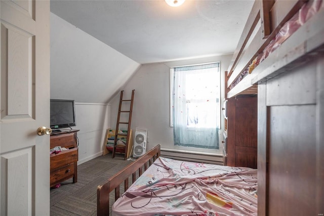 carpeted bedroom with lofted ceiling