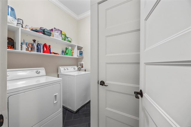 washroom with laundry area, crown molding, and washer and clothes dryer