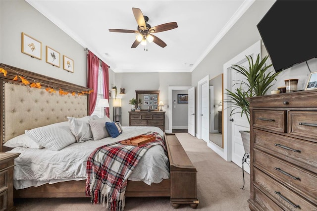 bedroom with light carpet, baseboards, ornamental molding, and a ceiling fan