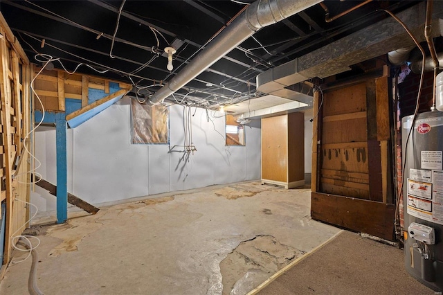 basement featuring water heater