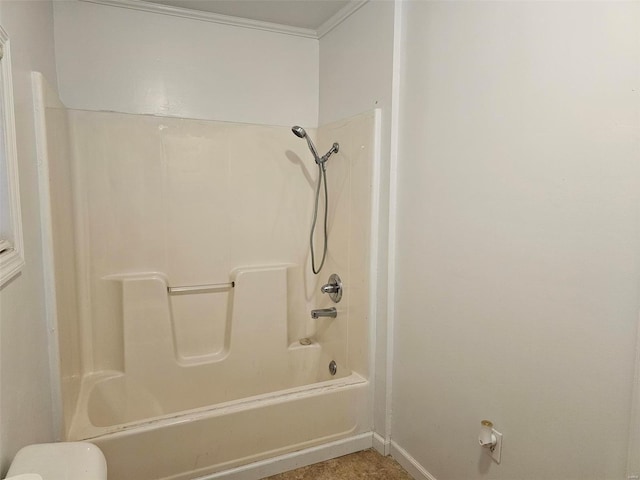 bathroom featuring bathing tub / shower combination and ornamental molding