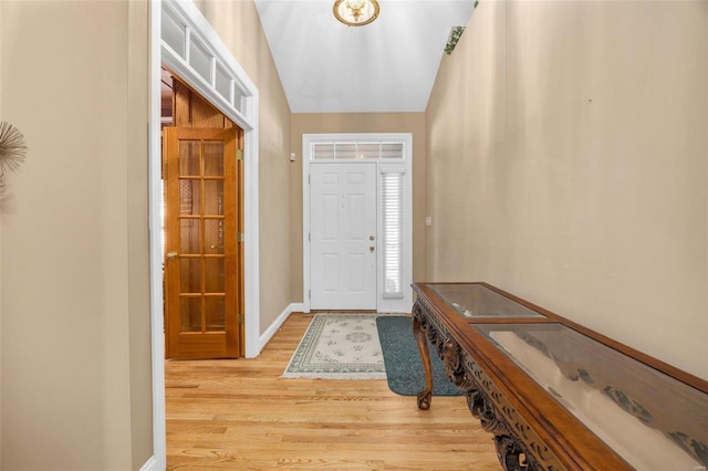 entrance foyer with hardwood / wood-style floors