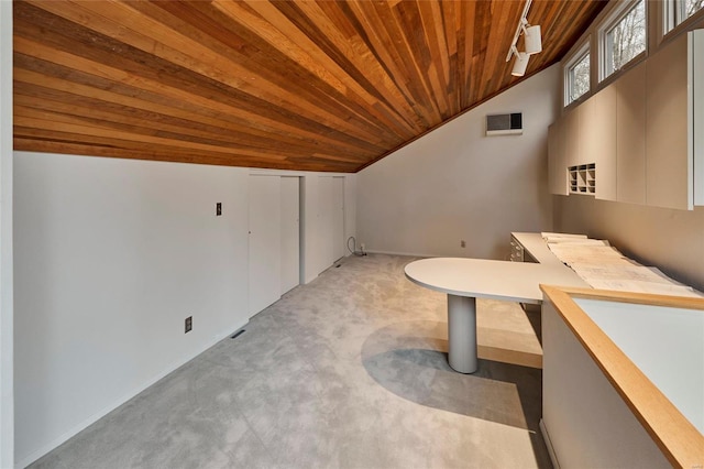 bathroom featuring wooden ceiling and vaulted ceiling