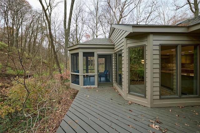 deck with a sunroom