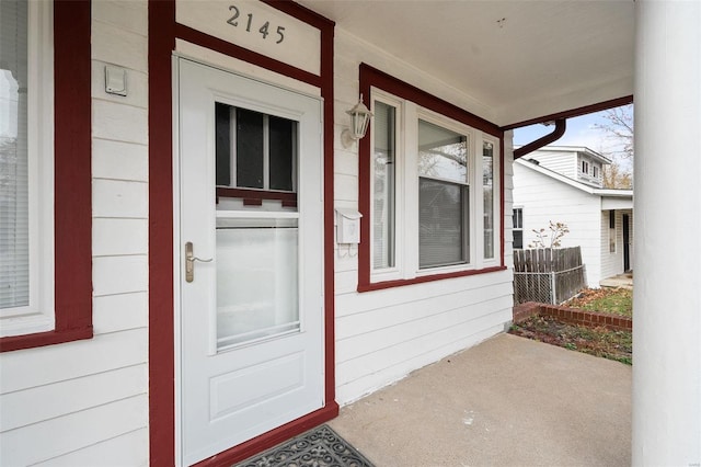 doorway to property with covered porch