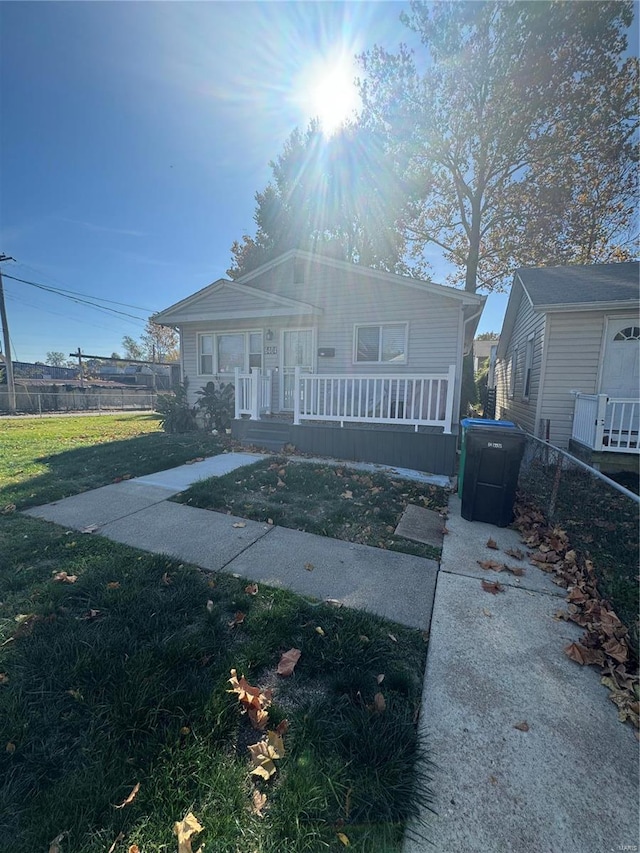 view of front of property with a front lawn