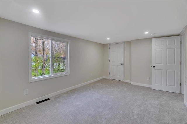 view of carpeted spare room