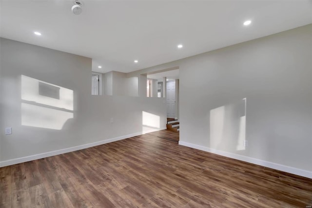 unfurnished room featuring wood-type flooring