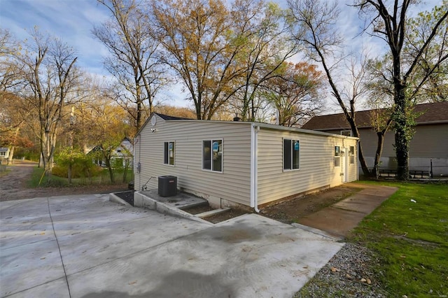 view of property exterior with cooling unit