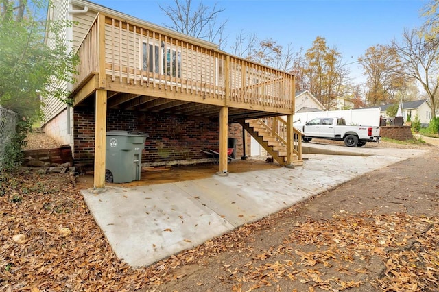 back of house featuring a deck