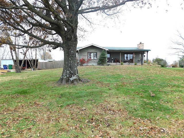 view of front of home with a front yard