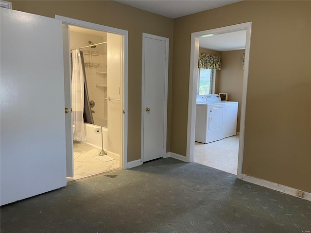 unfurnished bedroom featuring washer and dryer and ensuite bathroom