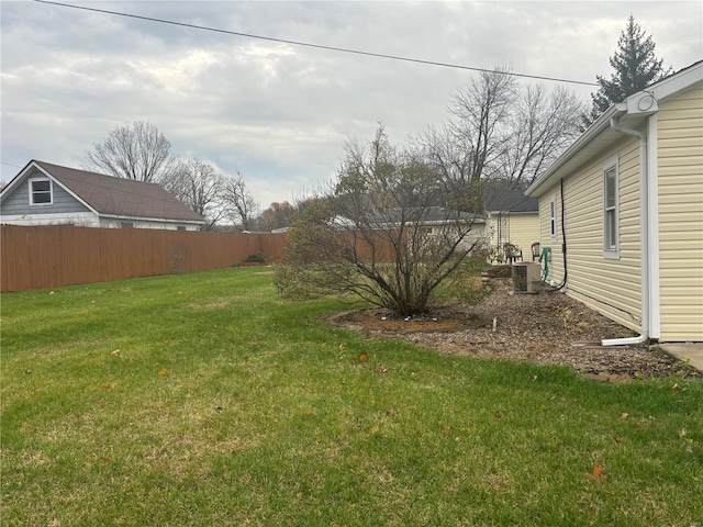 view of yard with central AC