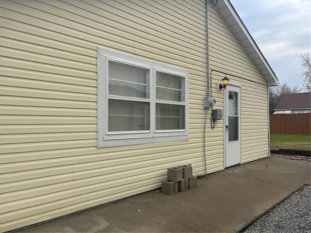 view of side of property featuring a patio