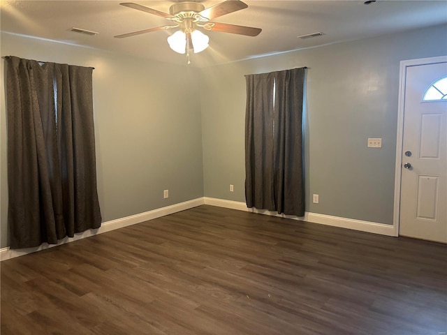 entrance foyer featuring dark hardwood / wood-style floors and ceiling fan