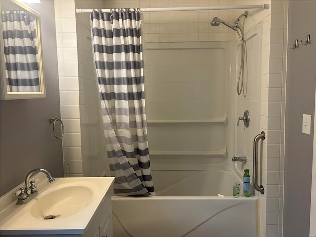 bathroom with shower / bath combo and vanity