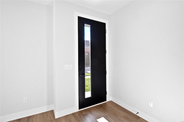 entrance foyer with hardwood / wood-style floors