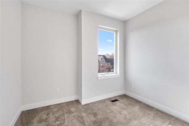 empty room with carpet floors