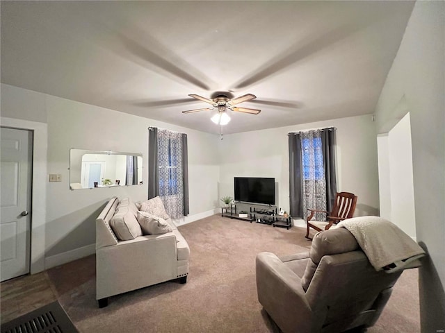 living room with carpet and ceiling fan