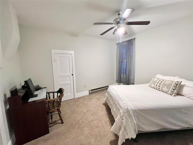 carpeted bedroom featuring ceiling fan and a baseboard heating unit