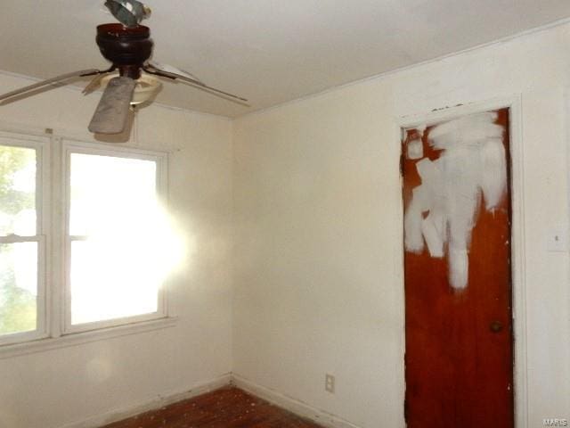 unfurnished room featuring ceiling fan