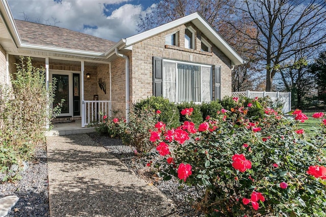 property entrance featuring covered porch