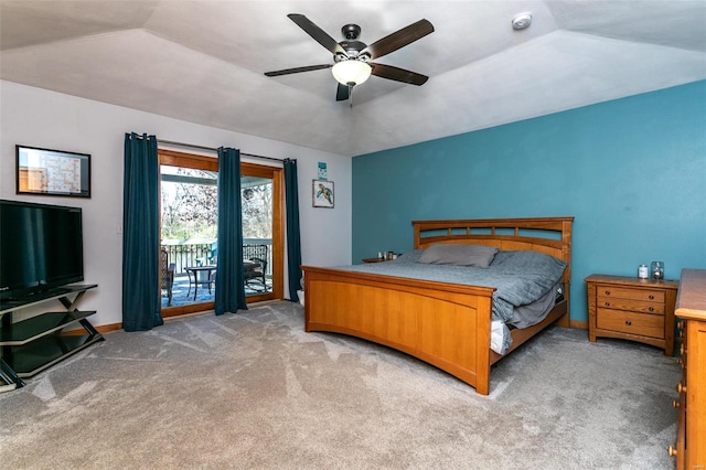 carpeted bedroom featuring ceiling fan, lofted ceiling, and access to outside