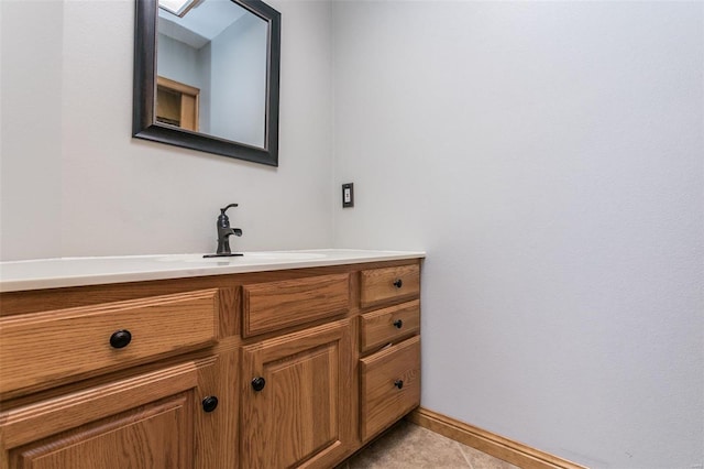 bathroom featuring tile patterned floors and vanity