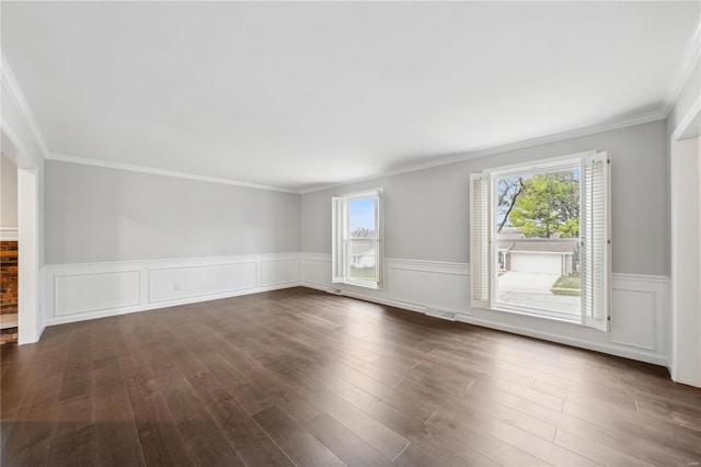 unfurnished room with crown molding and dark hardwood / wood-style flooring