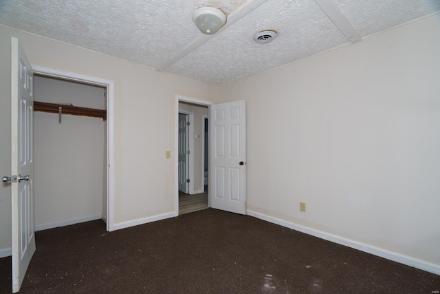 unfurnished bedroom with a closet