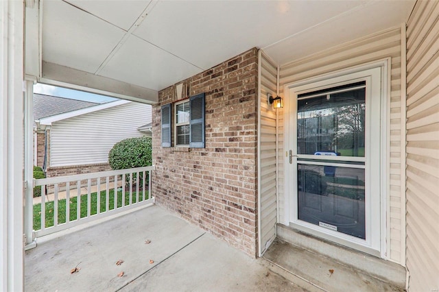 doorway to property with a porch