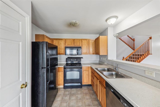 kitchen featuring sink and black appliances